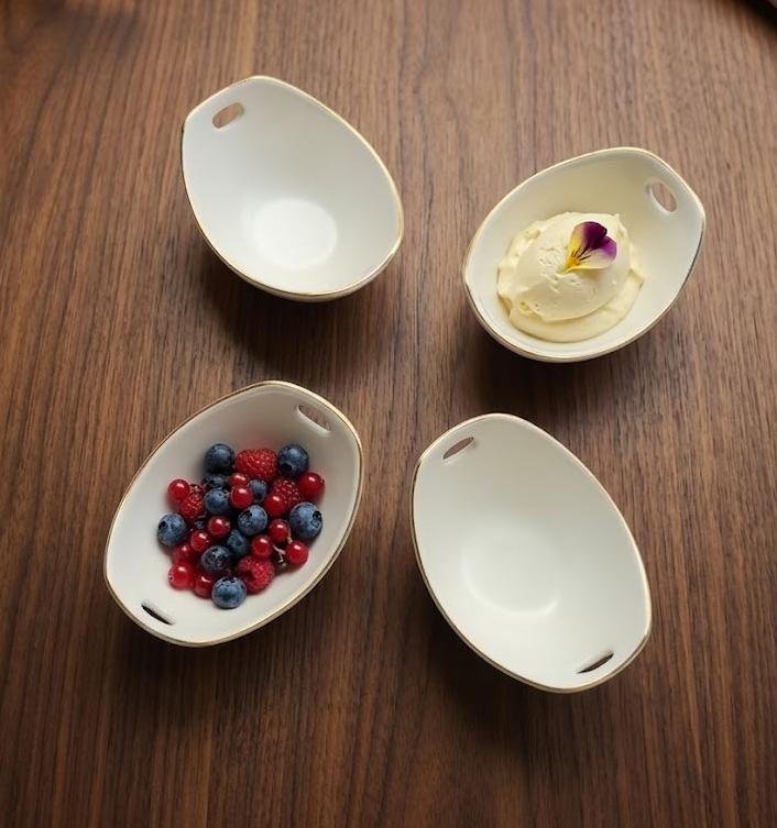 Premium Porcelain Golden Rim Oval Snack Bowl Set – 4 Pieces